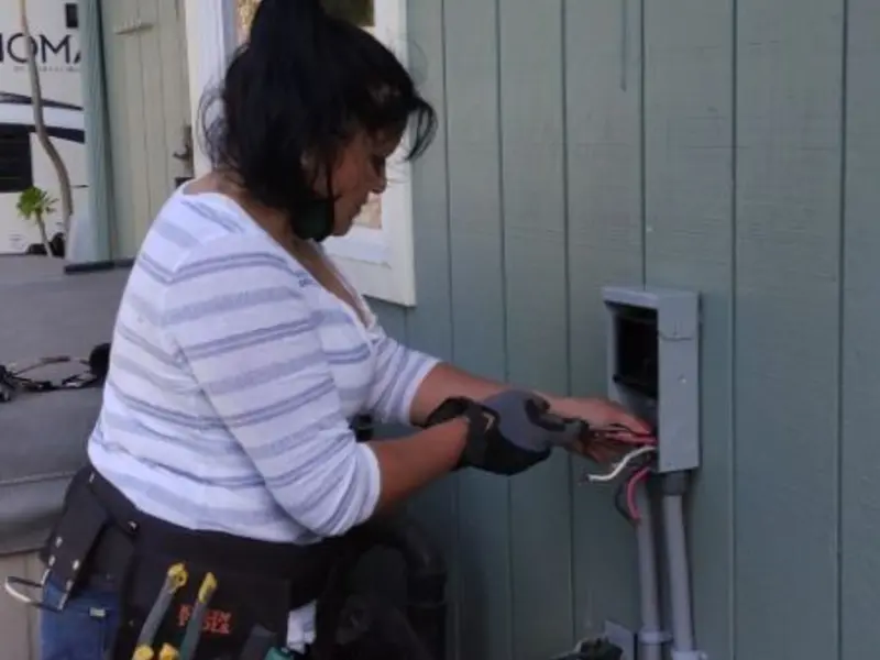 Licensed electrician wiring an exterior subpanel in Halifax