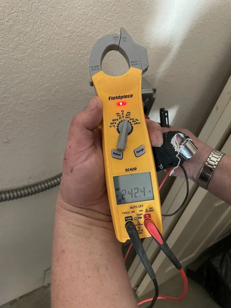 Voltage testing with clamp meter during Hot Tub / Pool Electrical Wiring in Halifax
